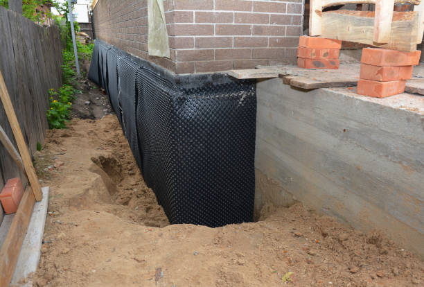 SJ Waterproofing Pros technician performing targeted Basement Waterproofing assessment in Mendham, NJ